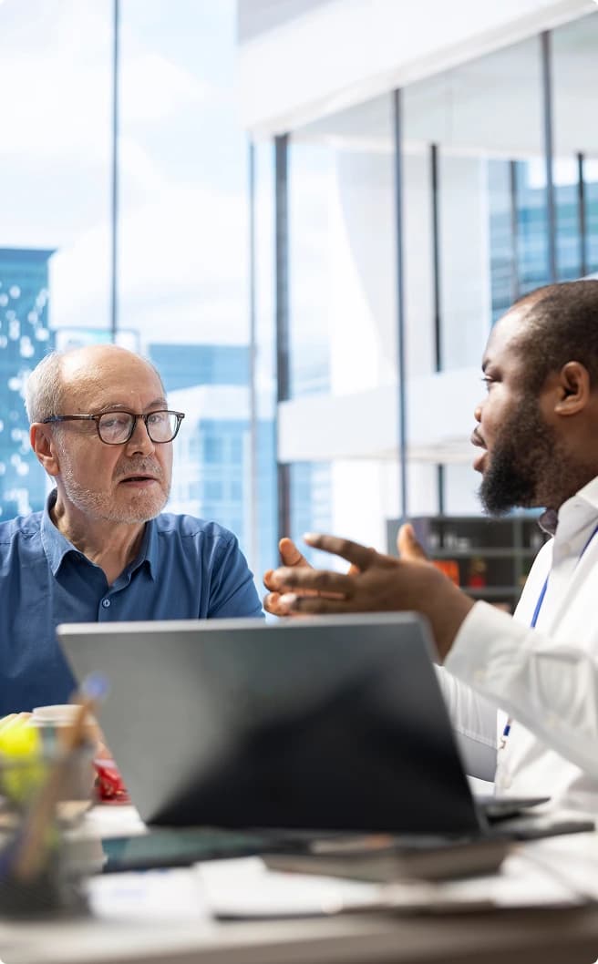 Team discussion with laptop